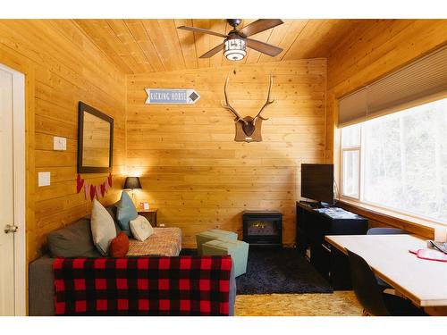 661 Golden Donald Upper Rd, Golden, BC - Indoor Photo Showing Bedroom With Fireplace