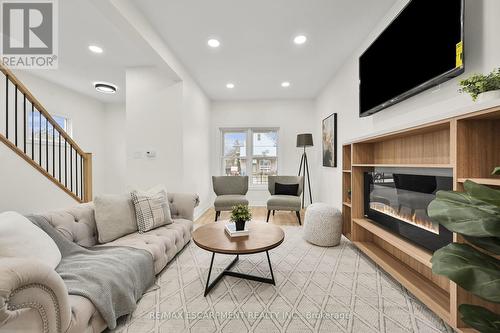 122 State Street, Welland, ON - Indoor Photo Showing Living Room With Fireplace