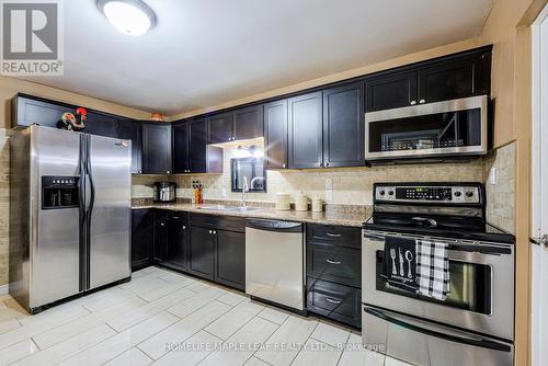 9620 Wellington Road 42, Erin, ON - Indoor Photo Showing Kitchen With Double Sink