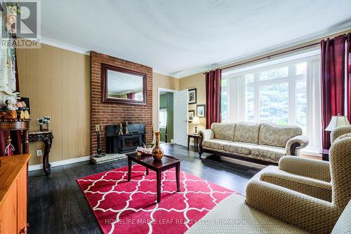 9620 Wellington Road 42, Erin, ON - Indoor Photo Showing Living Room With Fireplace