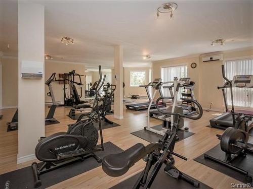 Salle d'exercice - 1107-7680 Boul. Marie-Victorin, Brossard, QC - Indoor Photo Showing Gym Room