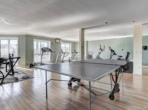 Salle d'exercice - 1107-7680 Boul. Marie-Victorin, Brossard, QC - Indoor Photo Showing Gym Room