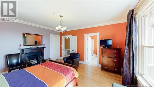 34 Seely Street, Saint John, NB - Indoor Photo Showing Bedroom With Fireplace
