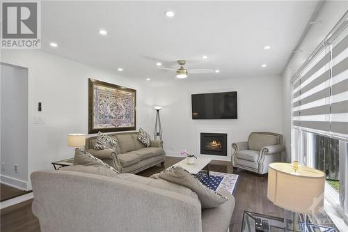 3056 Uplands Drive, Ottawa, ON - Indoor Photo Showing Living Room With Fireplace