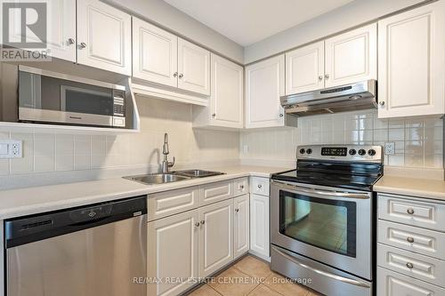 15C - 67 Caroline Street S, Hamilton, ON - Indoor Photo Showing Kitchen With Double Sink