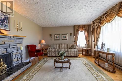 6565 Route 495, Sainte-Marie-De-Kent, NB - Indoor Photo Showing Living Room With Fireplace