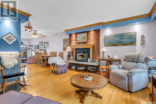 1209 Wiggins Avenue S, Saskatoon, SK - Indoor Photo Showing Living Room With Fireplace