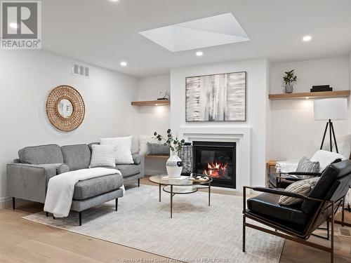 1211 Bainbridge Avenue North, Kingsville, ON - Indoor Photo Showing Living Room With Fireplace