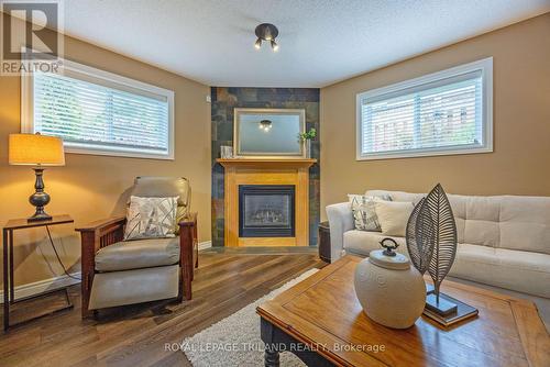 629 Longworth Road, London, ON - Indoor Photo Showing Living Room With Fireplace
