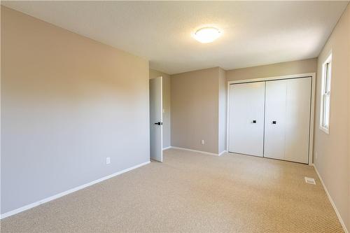 Primary Bedroom with large closet - 232 Windsor Street, Welland, ON - Indoor Photo Showing Other Room
