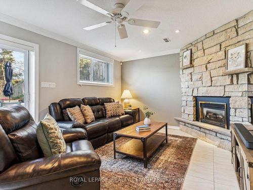 2350 Truscott Dr, Mississauga, ON - Indoor Photo Showing Living Room With Fireplace