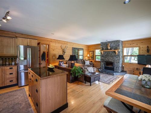 1075 Six Mile Creek Road, Vernon, BC - Indoor With Fireplace