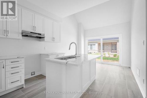 77 Muzzo Drive, Brampton, ON - Indoor Photo Showing Kitchen With Double Sink