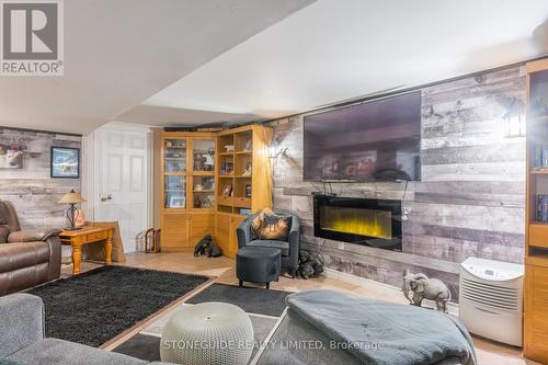 1567 Hwy 7A, Kawartha Lakes, ON - Indoor Photo Showing Living Room With Fireplace