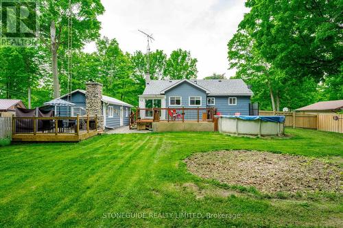 1567 Hwy 7A, Kawartha Lakes, ON - Outdoor With Above Ground Pool With Deck Patio Veranda With Backyard