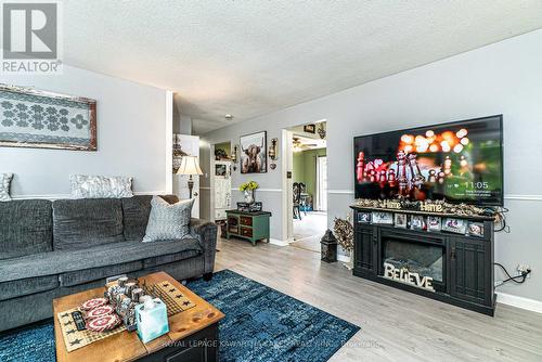 46 Grant Drive, Kawartha Lakes, ON - Indoor Photo Showing Living Room With Fireplace