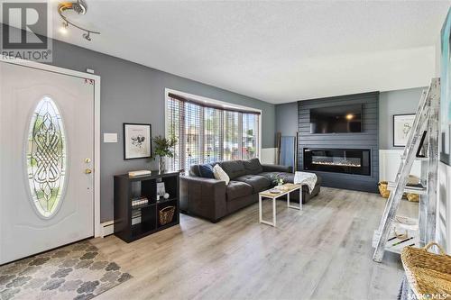 146 Galbraith Crescent, Saskatoon, SK - Indoor Photo Showing Living Room With Fireplace