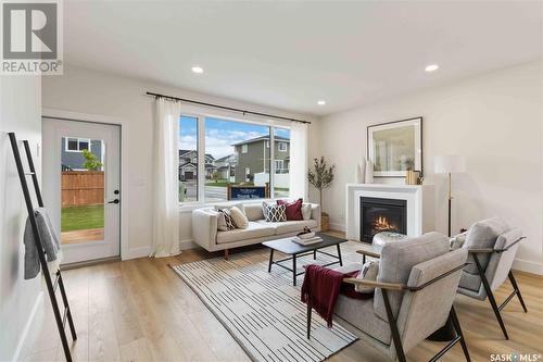 19 105 Hathway Crescent, Saskatoon, SK - Indoor Photo Showing Living Room With Fireplace