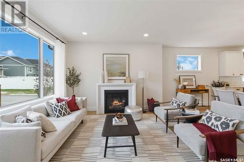 19 105 Hathway Crescent, Saskatoon, SK - Indoor Photo Showing Living Room With Fireplace