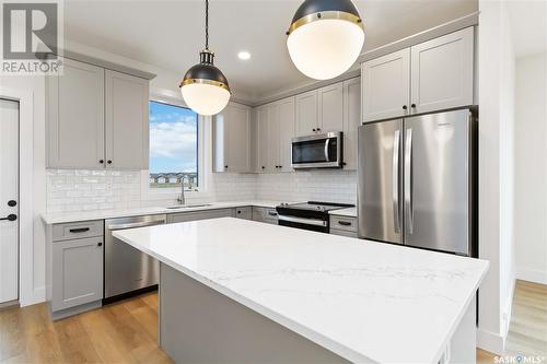 19 105 Hathway Crescent, Saskatoon, SK - Indoor Photo Showing Kitchen With Stainless Steel Kitchen With Upgraded Kitchen