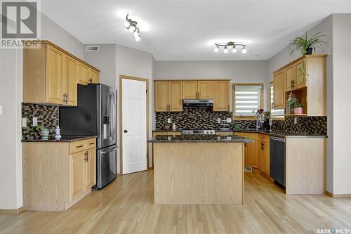 9346 Wascana Mews, Regina, SK - Indoor Photo Showing Kitchen With Double Sink
