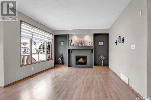 9346 Wascana Mews, Regina, SK - Indoor Photo Showing Living Room With Fireplace