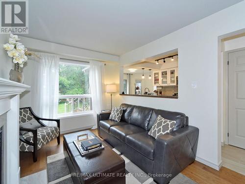 1127 Corrie Street, Innisfil, ON - Indoor Photo Showing Living Room With Fireplace