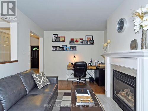 1127 Corrie Street, Innisfil, ON - Indoor Photo Showing Living Room With Fireplace