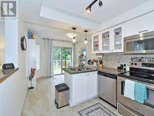 1127 Corrie Street, Innisfil, ON - Indoor Photo Showing Kitchen With Double Sink