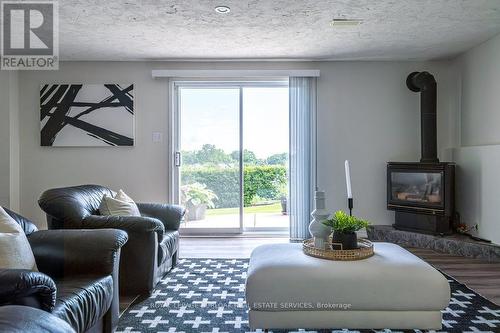 44 Jenny Court, Hamilton (Stoney Creek), ON - Indoor Photo Showing Living Room With Fireplace