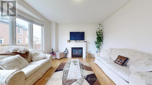 288 Elbern Markell Drive, Brampton, ON - Indoor Photo Showing Living Room With Fireplace