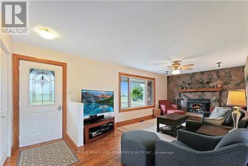 953 Lilac Road, Kawartha Lakes, ON - Indoor Photo Showing Living Room With Fireplace