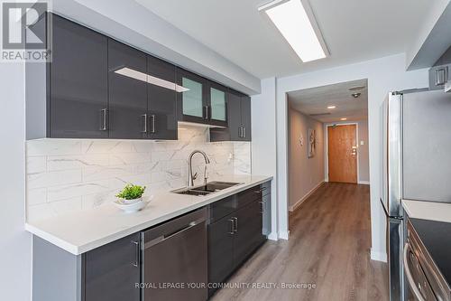 1406 - 4727 Sheppard Avenue E, Toronto, ON - Indoor Photo Showing Kitchen With Double Sink