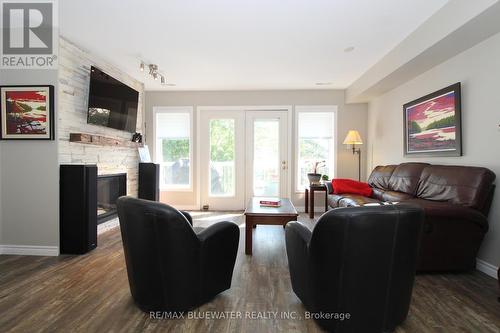 26 - 48 Ontario Street S, Lambton Shores (Grand Bend), ON - Indoor Photo Showing Living Room With Fireplace