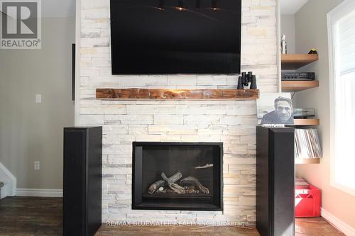 26 - 48 Ontario Street S, Lambton Shores (Grand Bend), ON - Indoor Photo Showing Living Room With Fireplace