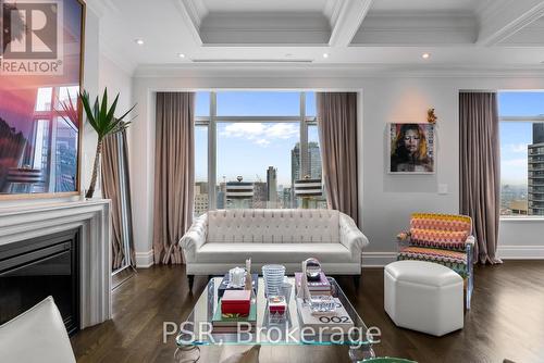 3901 - 311 Bay Street, Toronto (Bay Street Corridor), ON - Indoor Photo Showing Living Room With Fireplace