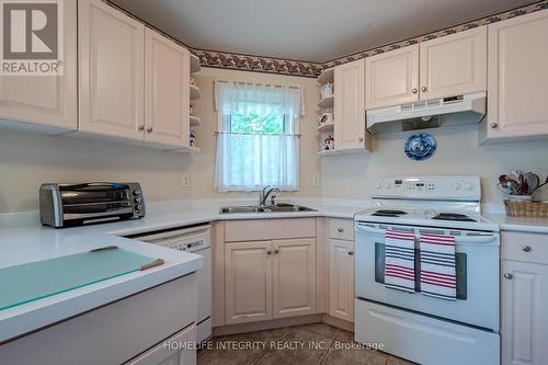 6 La Costa Court, New Tecumseth (Alliston), ON - Indoor Photo Showing Kitchen With Double Sink