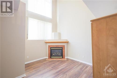 34 Briston Private, Ottawa, ON - Indoor Photo Showing Living Room With Fireplace