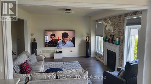 211 Lia Drive, Clearview (Stayner), ON - Indoor Photo Showing Living Room With Fireplace