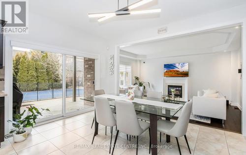 8536 Forestview Boulevard, Niagara Falls, ON - Indoor Photo Showing Dining Room With Fireplace