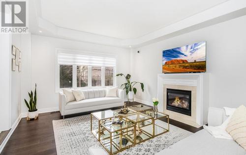 8536 Forestview Boulevard, Niagara Falls, ON - Indoor Photo Showing Living Room With Fireplace