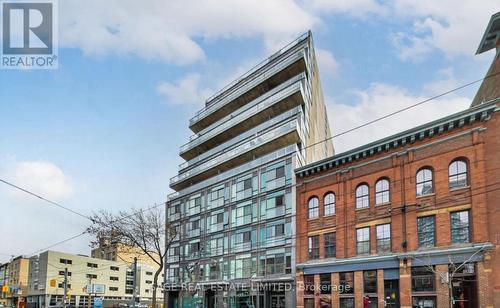 208 - 127 Queen Street E, Toronto, ON - Outdoor With Facade