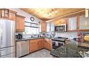 12821 Schaeffer Crescent, Summerland, BC  - Indoor Photo Showing Kitchen With Stainless Steel Kitchen With Double Sink 