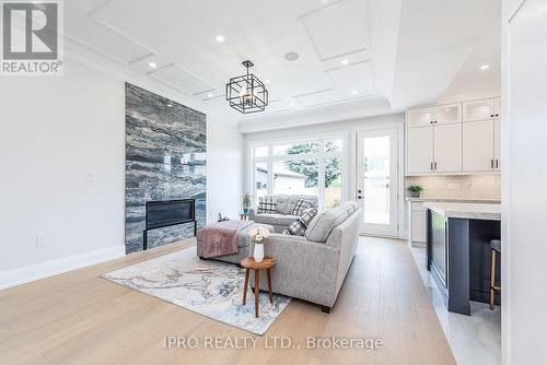 303 Delta Street, Toronto (Alderwood), ON - Indoor Photo Showing Living Room With Fireplace