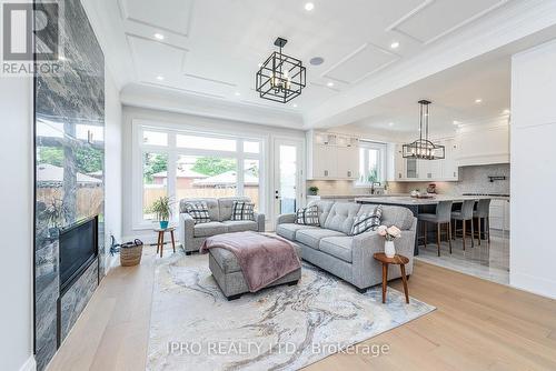 303 Delta Street, Toronto (Alderwood), ON - Indoor Photo Showing Living Room With Fireplace