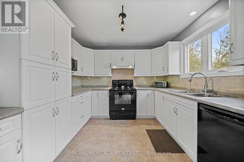 28 Andrew Court, Kawartha Lakes, ON - Indoor Photo Showing Kitchen With Double Sink