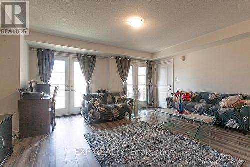 51 - 200 Veterans Drive, Brampton, ON - Indoor Photo Showing Living Room With Fireplace