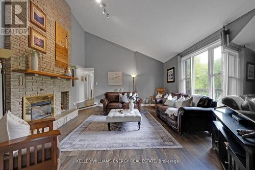 99 Willow Glen Drive, Kawartha Lakes, ON - Indoor Photo Showing Living Room With Fireplace