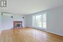 298 Route 105, Maugerville, NB  - Indoor Photo Showing Living Room With Fireplace 