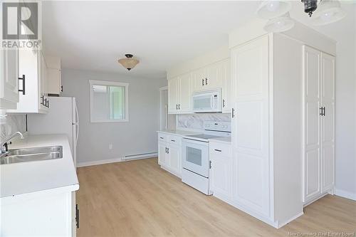 298 Route 105, Maugerville, NB - Indoor Photo Showing Kitchen With Double Sink